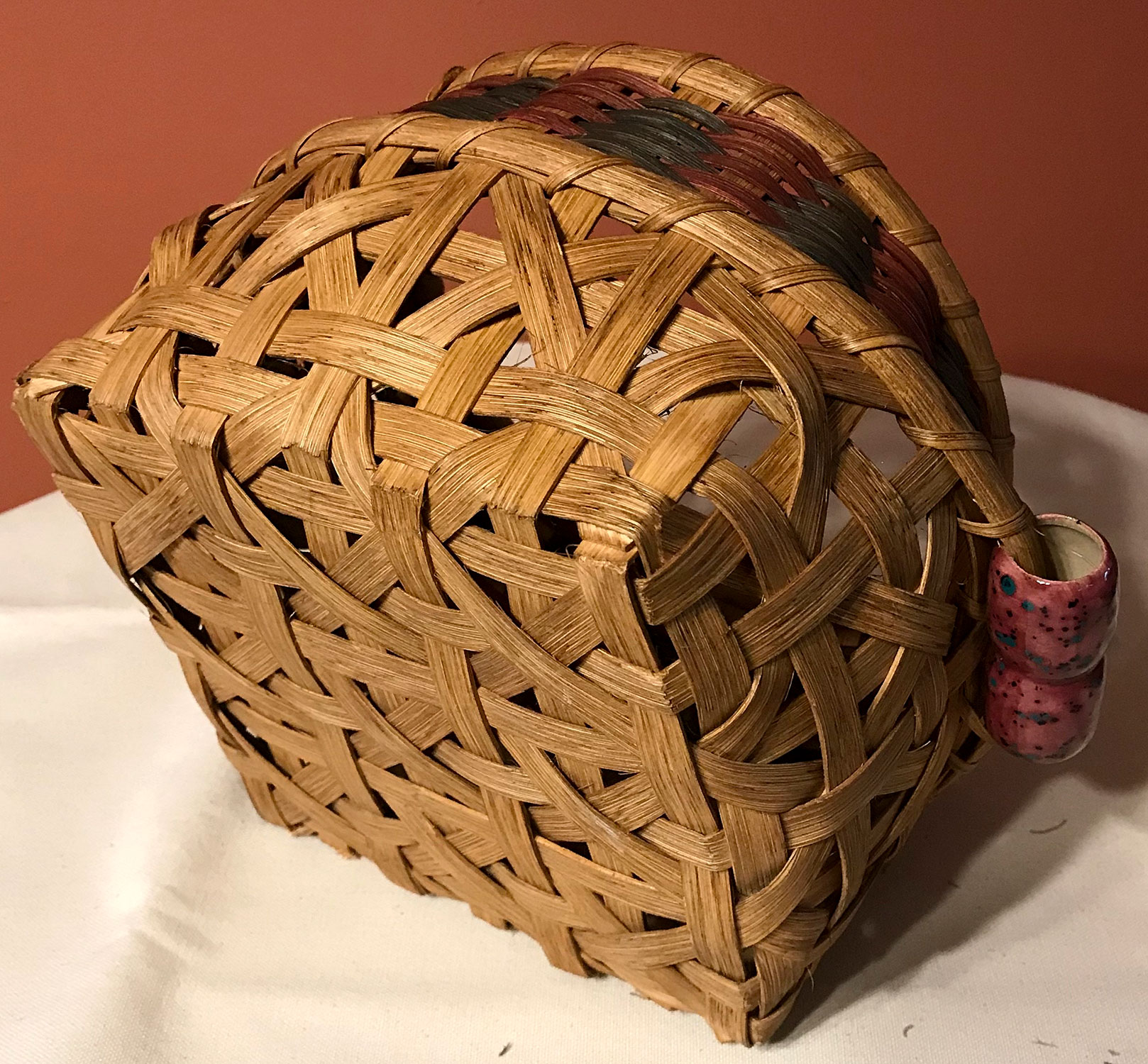 Bottom of an Intricate Basket with Ceramic Handles